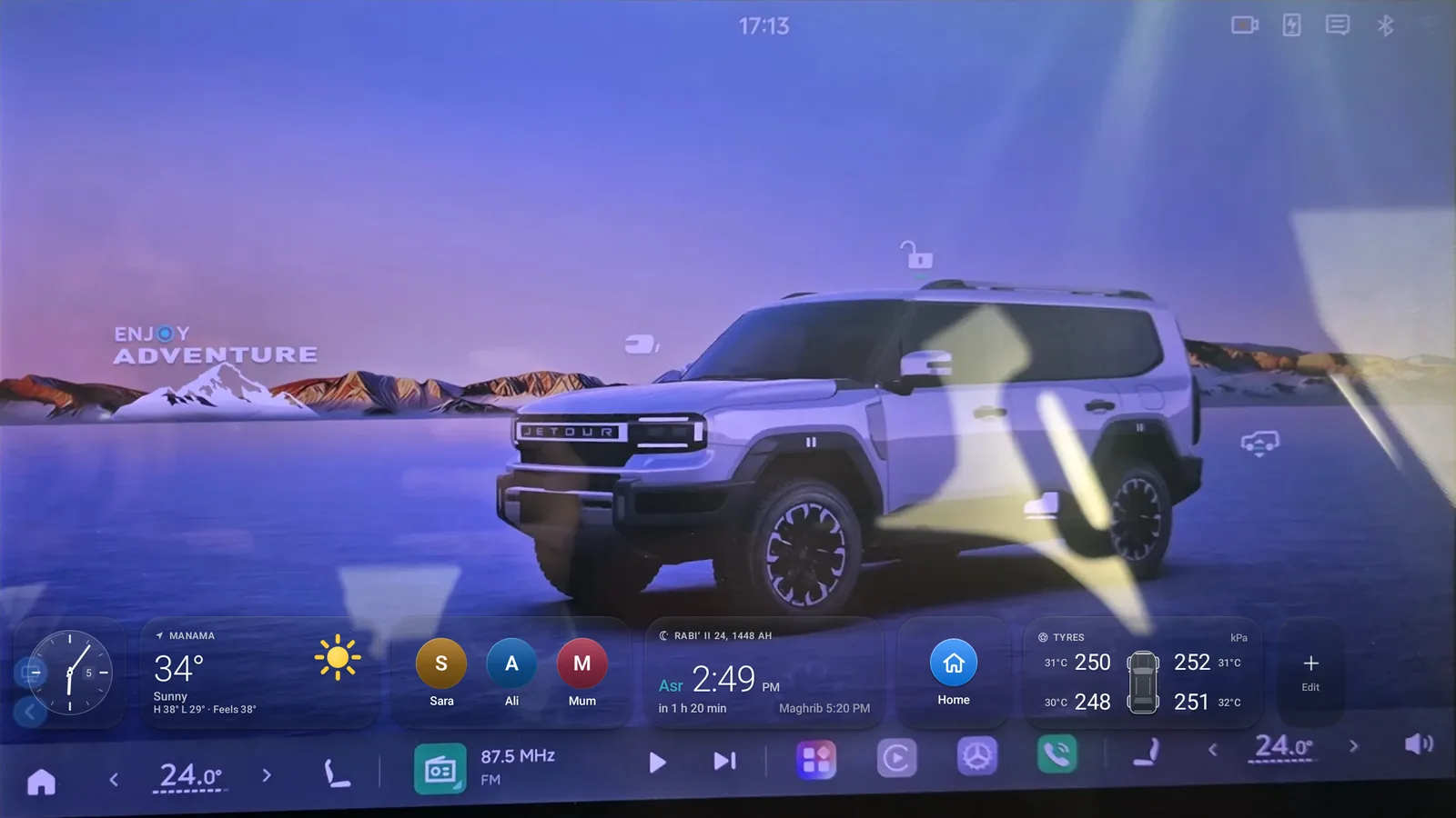 The G700 Home strip above the car's dock, with the new Quick contacts, Prayer times and Navigate widgets.